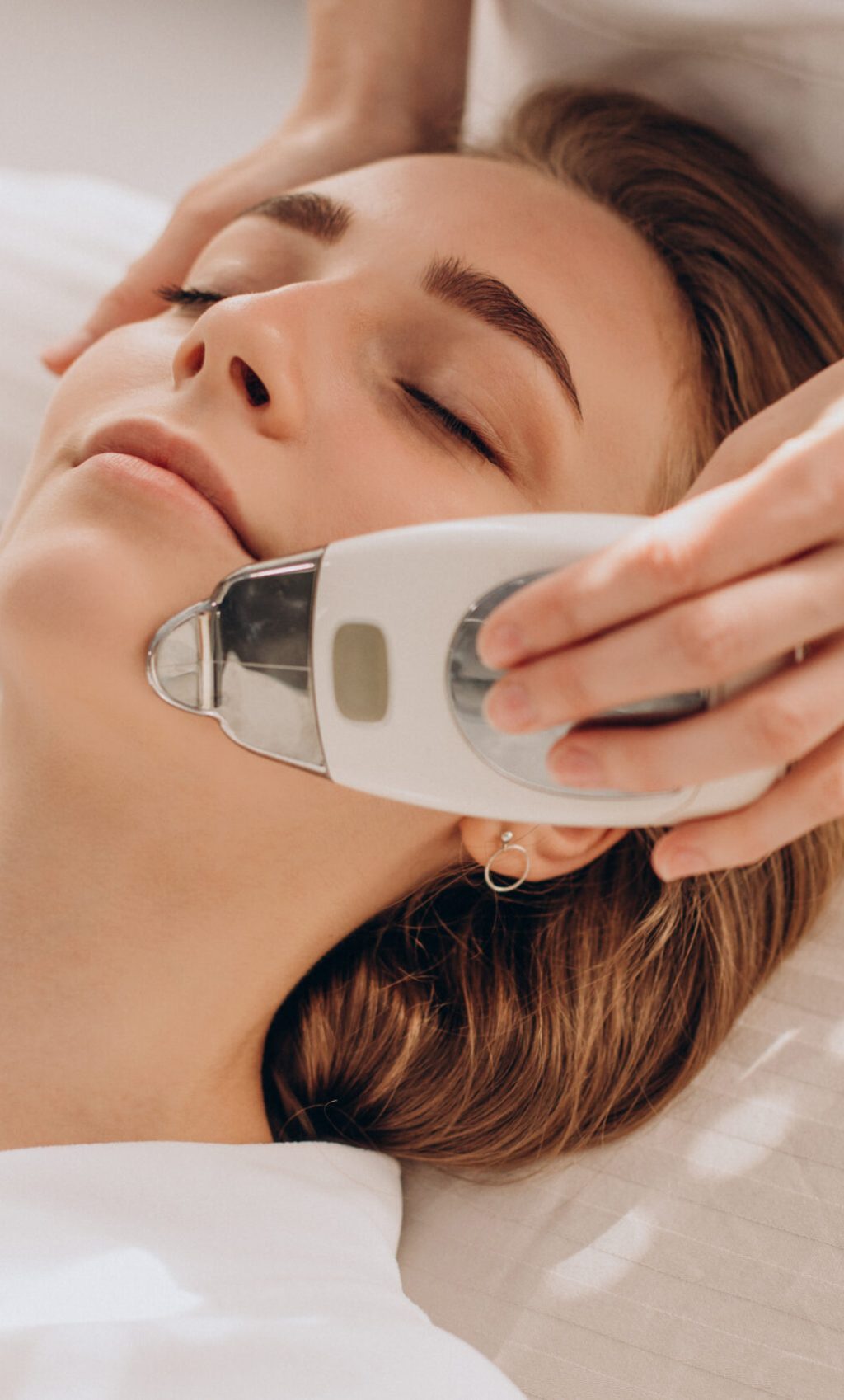 Woman having beauty treatment procedures ina salon